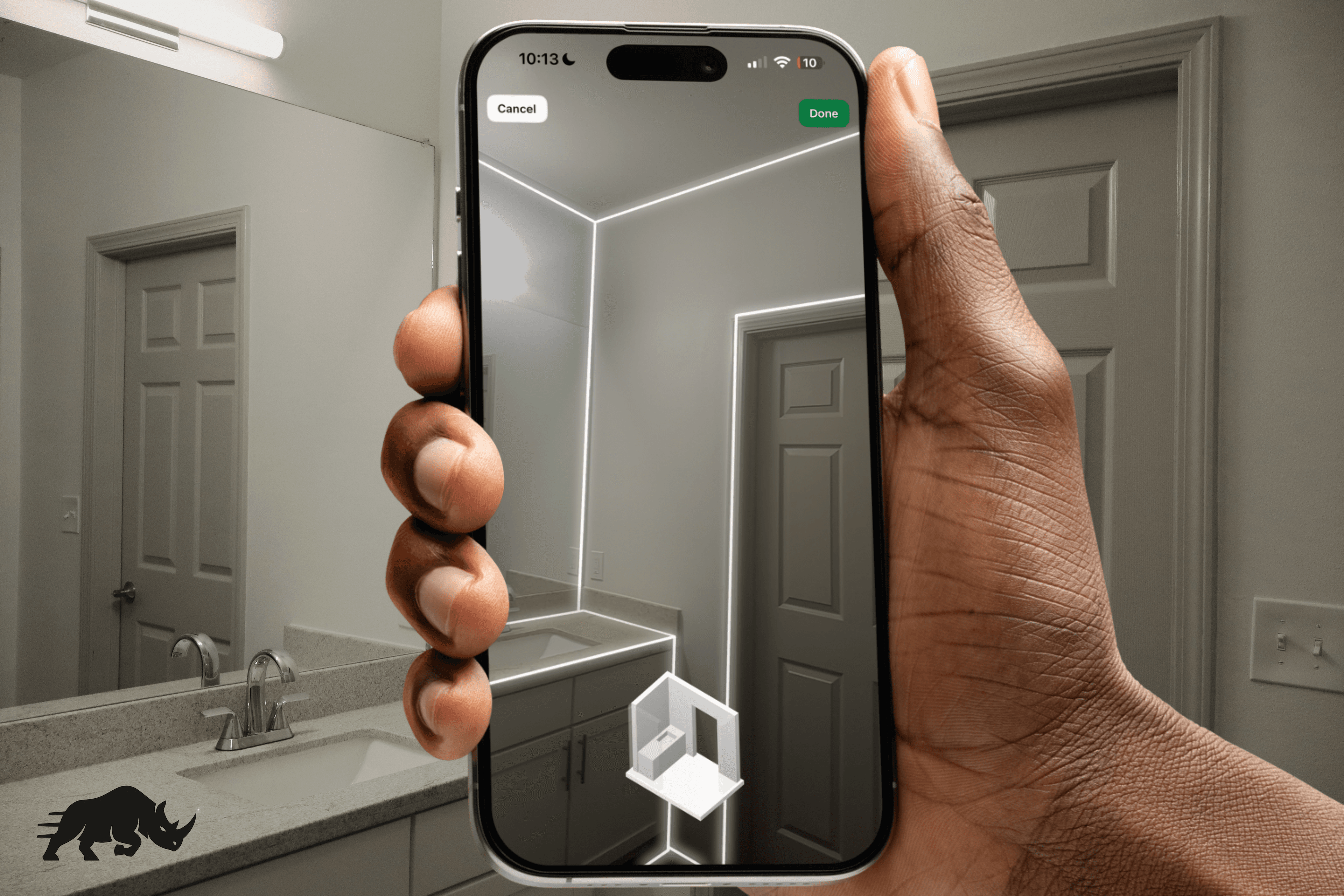 Hand holding an iPhone while scanning a room with LiDAR in Rhino Bid